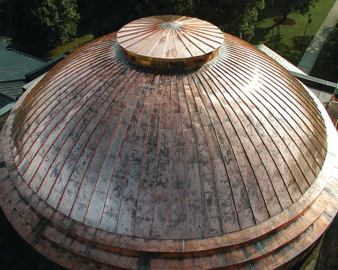 Craftsman Roofing crew installing a new roof in Amesbury